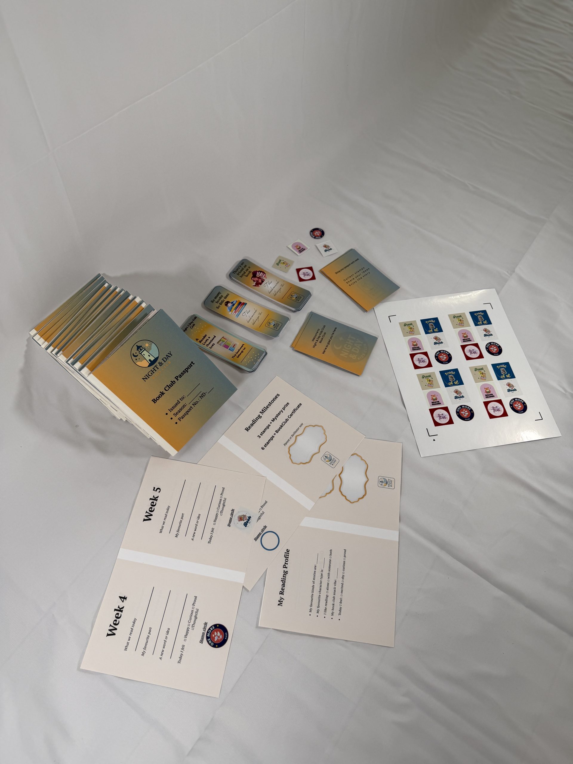 Coordinated event print materials including custom booklets, bookmarks, and sticker sheets in London Ontario.